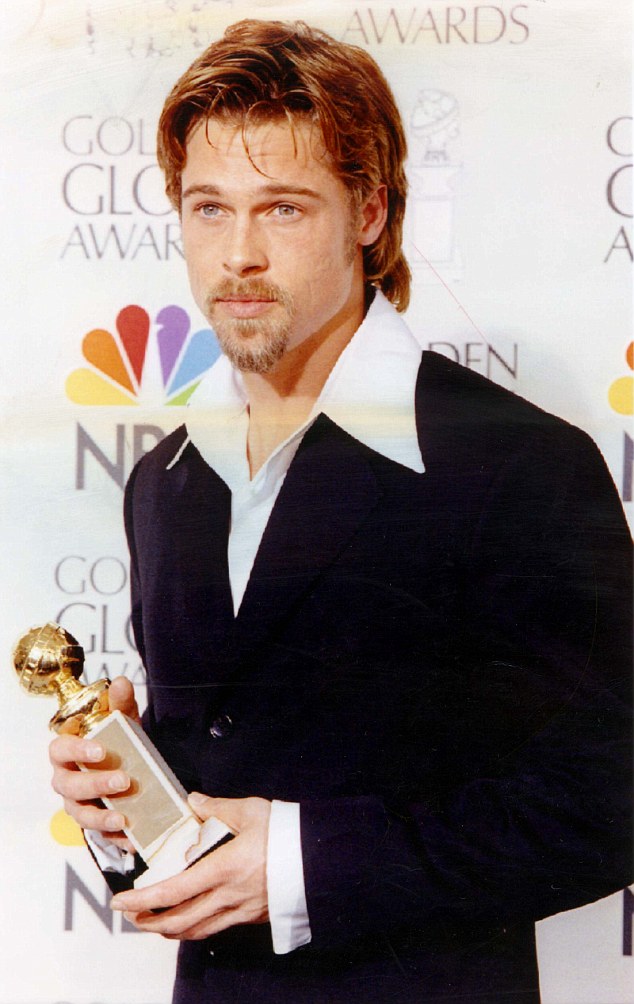 PKT3721-269308 ACTOR - BRAD PITT 1996 American actor Brad Pitt holds his Best Supporting Actor-Motion Picture Award he recieved at the 53rd Annual Globe Globes Awards in Beverly Hills, California for his role in '12 MONKEYS'.
