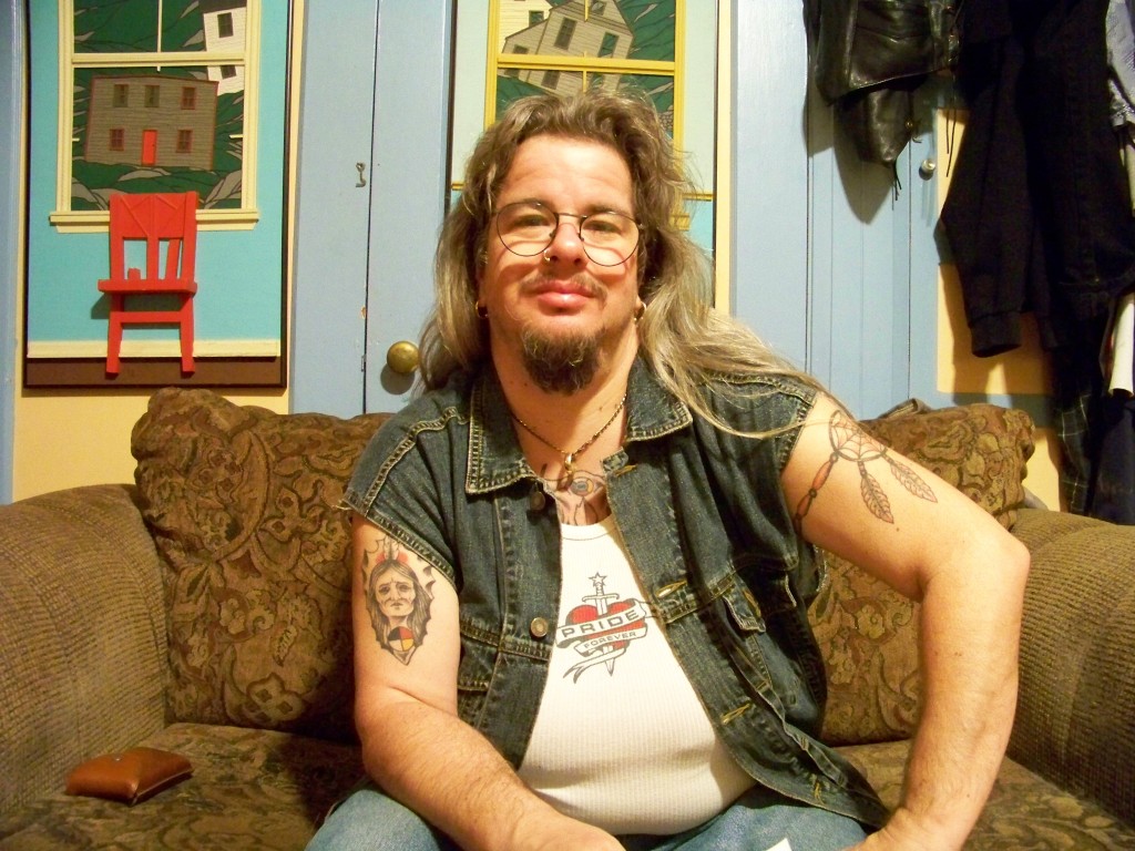 alec-butler-sitting-on-couch