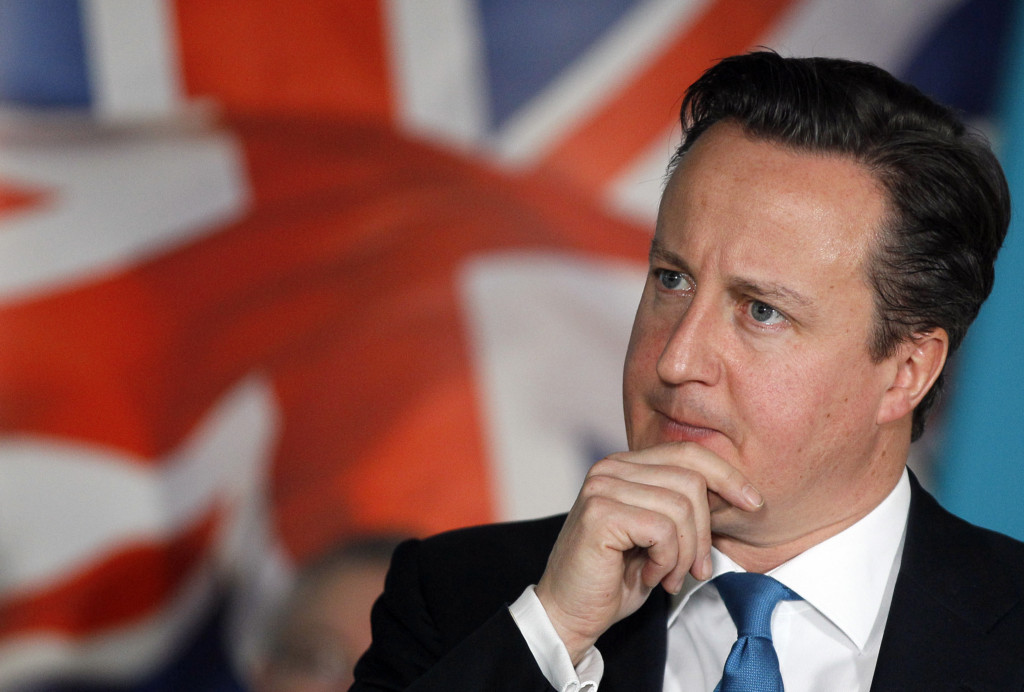 Britain's Prime Minister David Cameron listens to a question during a Prime Minister Direct session during a visit to accountancy software company Intuit, in Maidenhead, England, Thursday, Jan. 5, 2012. (AP Photo/Kirsty Wigglesworth, pool)