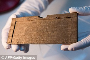 34D20D7700000578-3622194-Archaeologists_have_unearthed_hundreds_of_wooden_tablets_picture-a-6_1464887838095