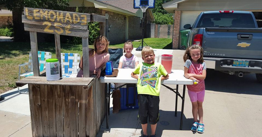 9_year_old_sets_up_lemonade_stand_to_raise_money_for_brothers_surgery_featured