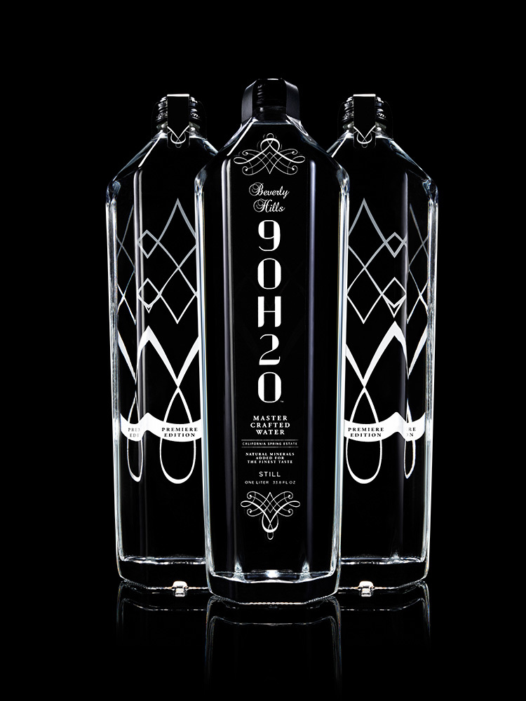 9oh2o-one-liter-glass-still-bottle-front-with-bottle-backs-on-black-max-10-web