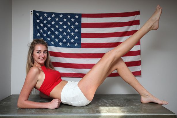 Holly-Burt-posing-in-front-of-the-American-Flag-on-September-25-2015-in-New-York-City