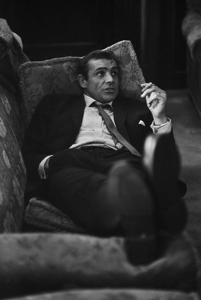 28th October 1963:  British actor Sean Connery lounges on a sofa with a cigarette. He is in London during filming of the thriller 'Woman of Straw' with Gina Lollobrigida.  (Photo by Bob Haswell/Express/Getty Images)