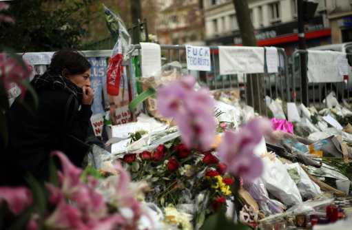 EDITORS NOTE CONTENT Floral tributes continue to be left near the Bataclan concert hall in Paris following the terrorist attacks on Friday evening.