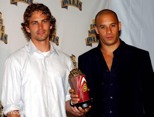 Paul Walker and Vin Diesel pose with their Award for 'Best on-screen Team' back stage at the 2002 MTV Movie Awards at Shrine Auditorium, Los Angeles.