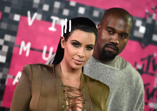Kim Kardashian, left, and Kanye West arrive at the MTV Video Music Awards at the Microsoft Theater on Sunday, Aug. 30, 2015, in Los Angeles. (Photo by Jordan Strauss/Invision/AP)