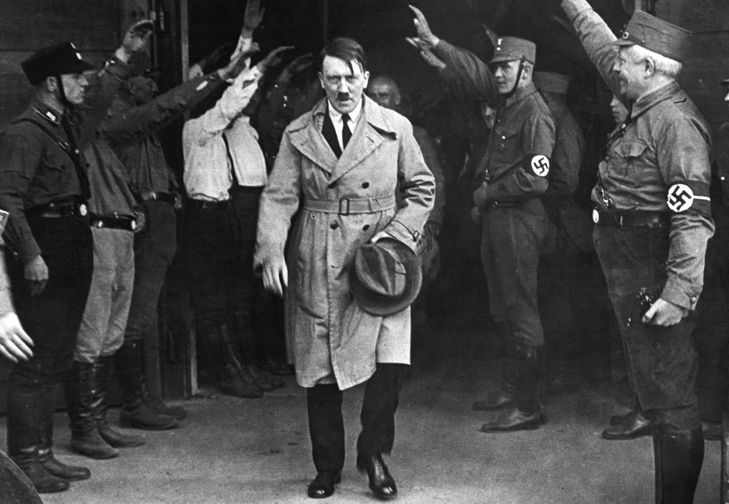 Adolf Hitler, leader of the National Socialists, emerges from the party's Munich headquarters on December 5, 1931.  Hitler predicted his Nazi party would one day control Germany. (AP Photo)