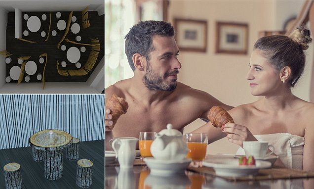 Young undressed couple have breakfast in the morning