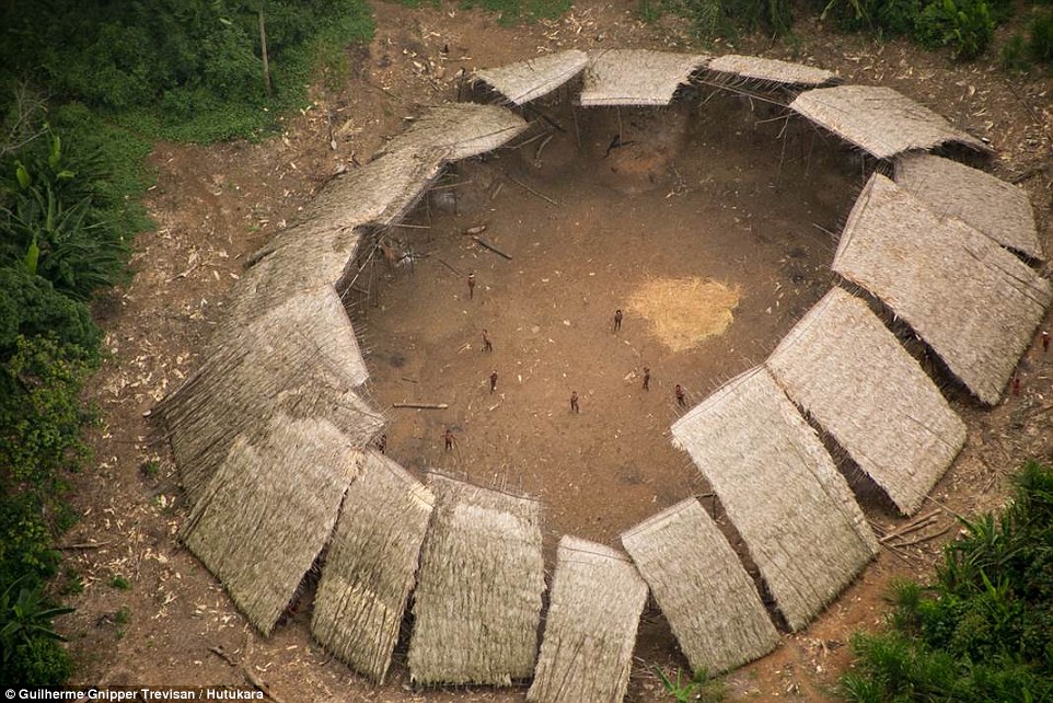 3a7a186600000578-3946254-the_photographs_show_an_uncontacted_tribal_community_estimated_t-a-32_1479408500694