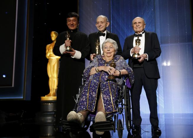 (L-R) Honorary Award winners Jackie Chan, Frederick Wiseman, Anne V. Coates and Lynn Stalmaster pose on stage at the 8th Annual Governors Awards in Los Angeles, California, U.S., November 12, 2016.  REUTERS/Mario Anzuoni
