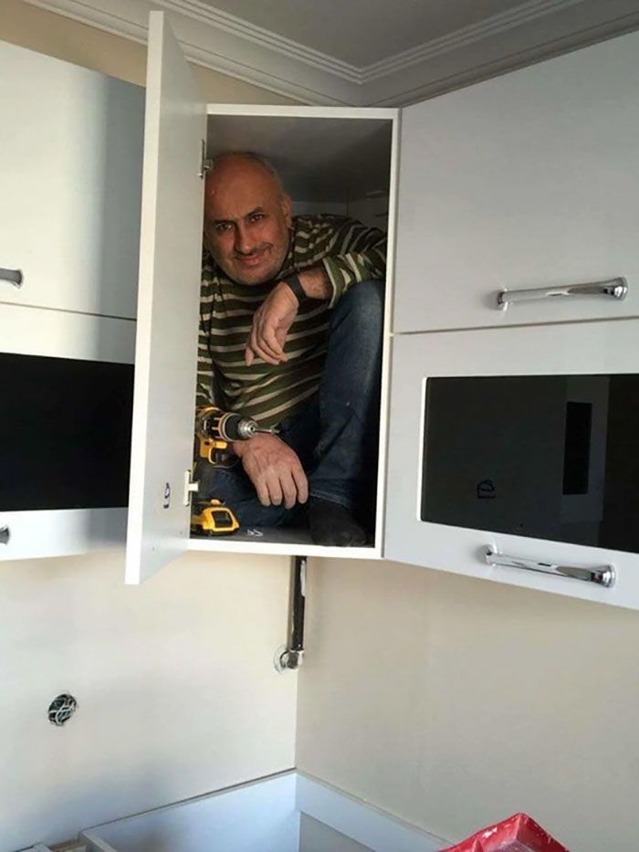 contractor-testing-cabinet-strength-funny-photoshop-battle-38